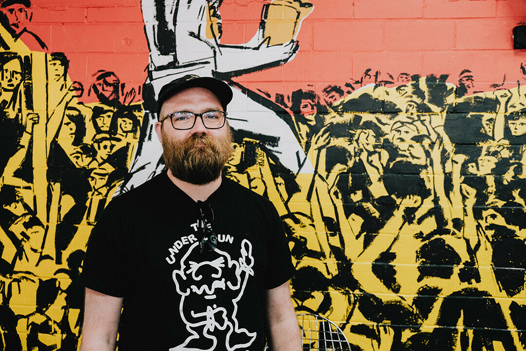 Evan Minsker portrait at Feel It Record Shop in Cincinnati, Ohio after see/saw’s punk community open forum; photo by Mayson Rainwater  See More from Tom Giffey