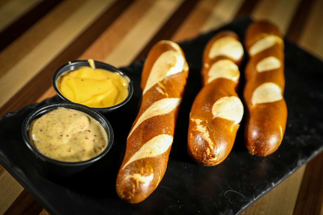 Soft pretzels with dipping sauce.