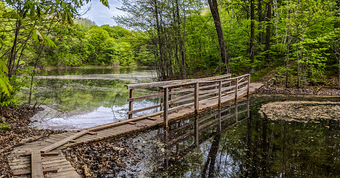 LACE UP YOUR HIKING BOOTS. Enjoy the changing seasons while traversing the Ice Age Trail, and win some goods while you're at it. (Photo via Go Chippewa County)