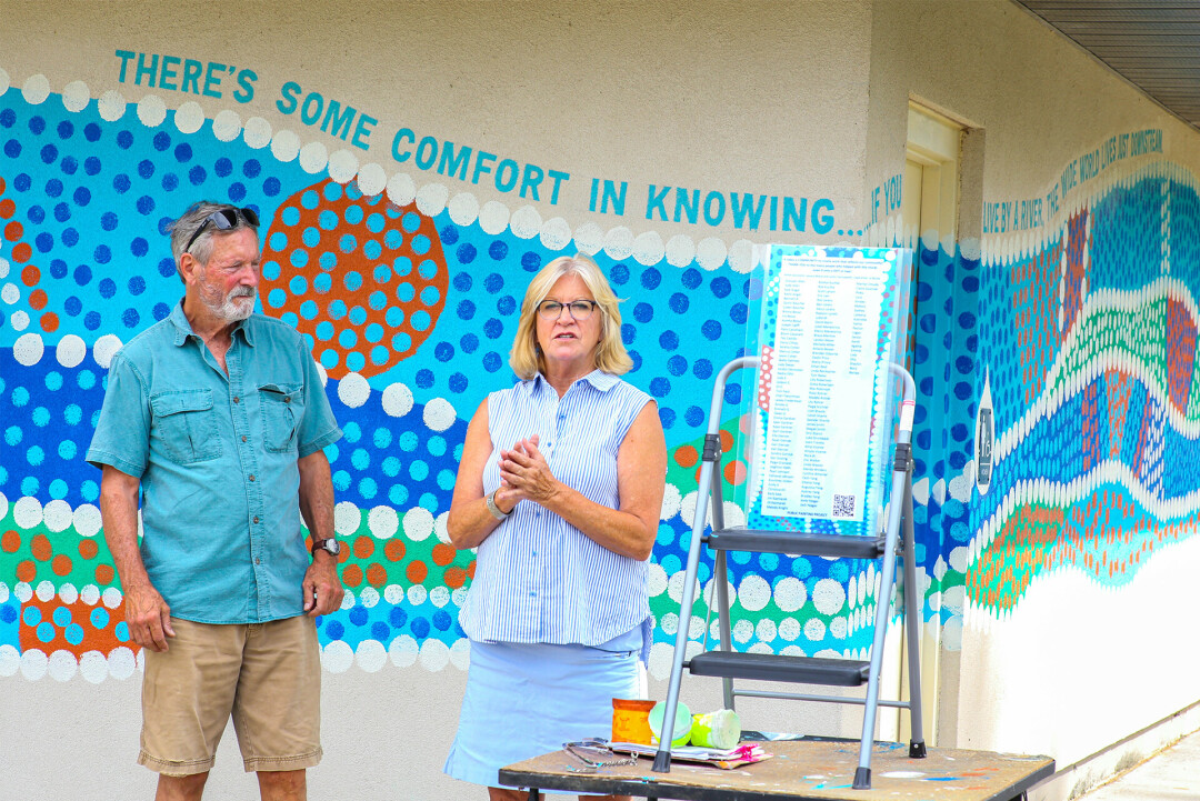 Jo Ellen Burke, middle, and John Hildebrand speaking to those at the Sept. 13 ceremony.