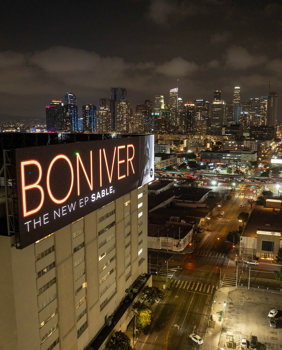 BIG NEWS. A digital billboard for Bon Iver’s new EP, SABLE, looms over Los Angeles. (Photo via Facebook)