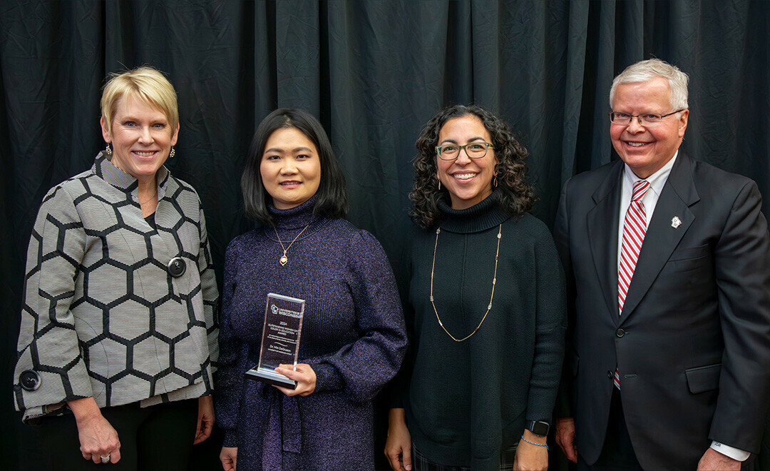 Outstanding Women of Color in Education award recipient Min DeGruson (second on left), with Chancellor Katherine Frank, Provost Glendalí Rodríguez and UW President Jay Rothman. Photo contributed by Universities of Wisconsin.