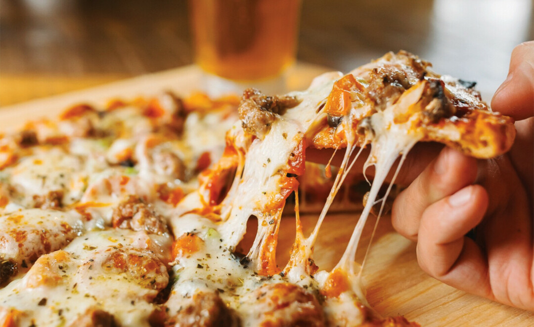 C'mon, look at that cheese pull. (Photo by SMMG Photography)