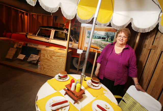 Susan McLoed, director of the Chippewa Valley Museum, in the Putnam Heights Neighborhood exhibit.