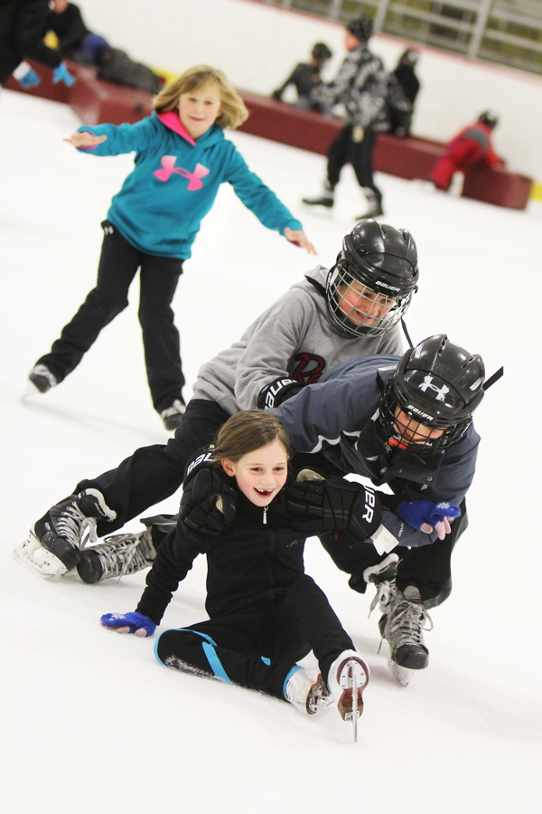 ALL ABOARD THE POLAR EXPRESS. A group of friends enjoy open skating at Hobbs Ice Center on a recent Wednesday afternoon. Open skating is available for adults and children nearly every Sunday and Wednesday through the end of March. Call 715-839-5040 for details.