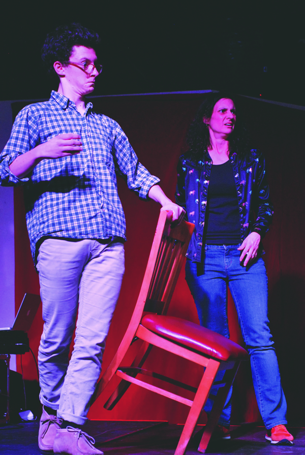 Eau Claire Improv Festival organizer Amber Dernbach (right) brings confused hilarity to a scene with Mack Hastings