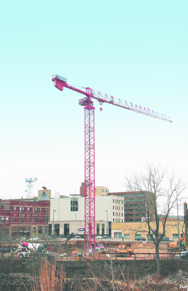 CRANE AS IT EVER WAS. Currently one of downtown Eau Claire’s tallest structures, a big ol’ construction crane appeared last week to help build the Haymarket Landing project.