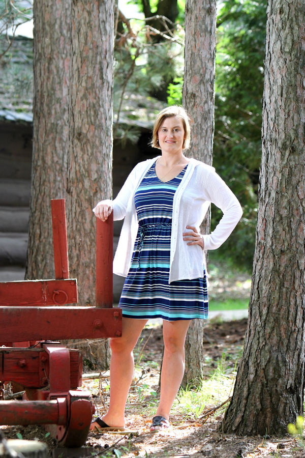 LOGGING ON. Author Caroline Akervik poses at the Paul Bunyan Logging Camp Museum in Carson Park. 