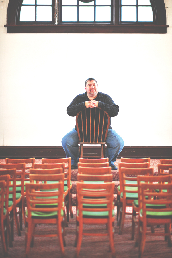 FINDING AN AUDIENCE. Red Cedar Youth Stage director Blaine Halverson in the theater group’s new performance space above The Acoustic Café in Menomonie. 
