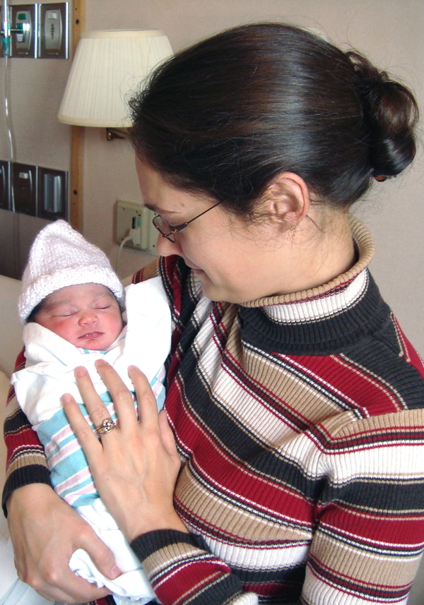 Doula Rhonda Gearing with a newborn at HSHS Sacred Heart Hospital in Eau Claire. Photo courtesy of Rhonda Gearing. 