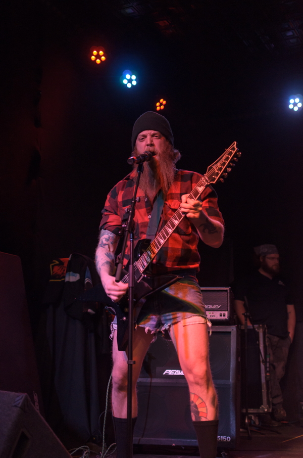 Taking the “lumbersexual” trend to frightening new levels, Nate “Bones” Knoeck covers Nirvana with local metal band Caveat for (the fantastic) Decadent Cabaret 2015 (Mar. 5–7) at the House of Rock.