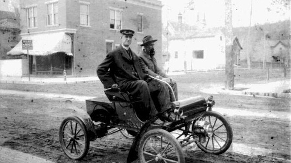 Hell of a car, hell of a coat, hell of a beard. Barstow Street, Eau Claire. 