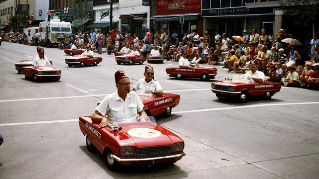 No one drives tiny cars like The Shriners. (Barstow Street, downtown Eau Claire.)