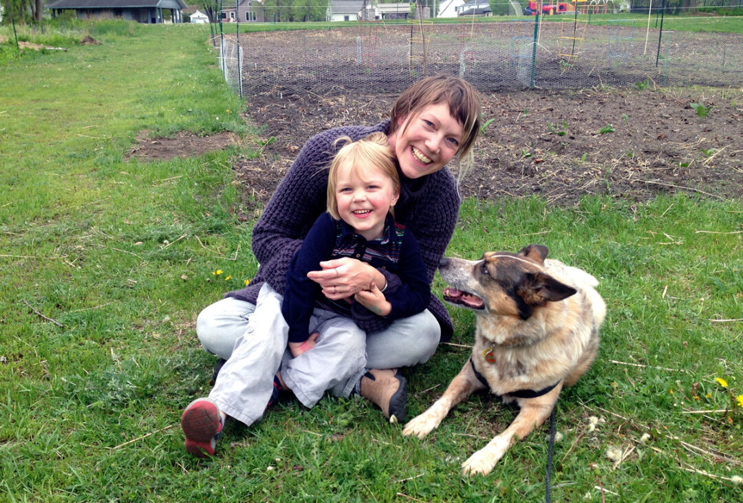 Laura Lash, her son, and pup.