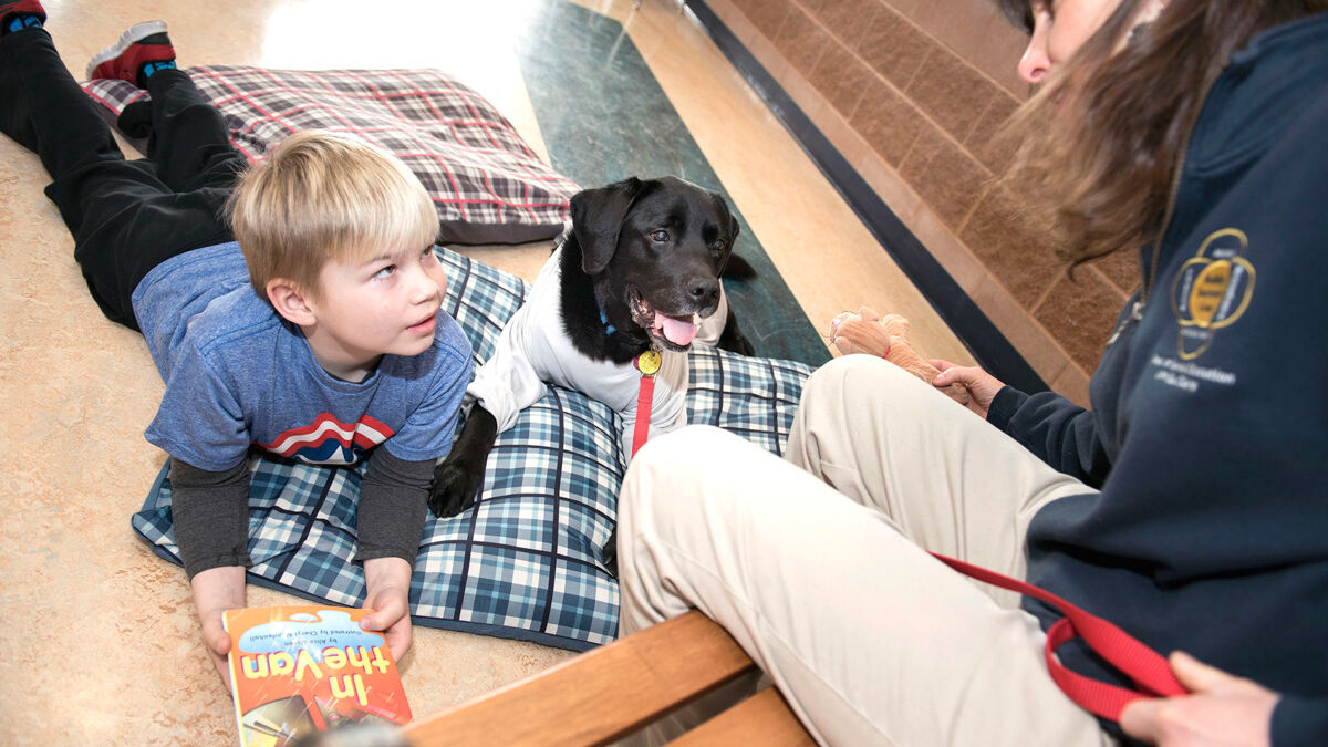 Cooper Reading With Rover Reading to Rover