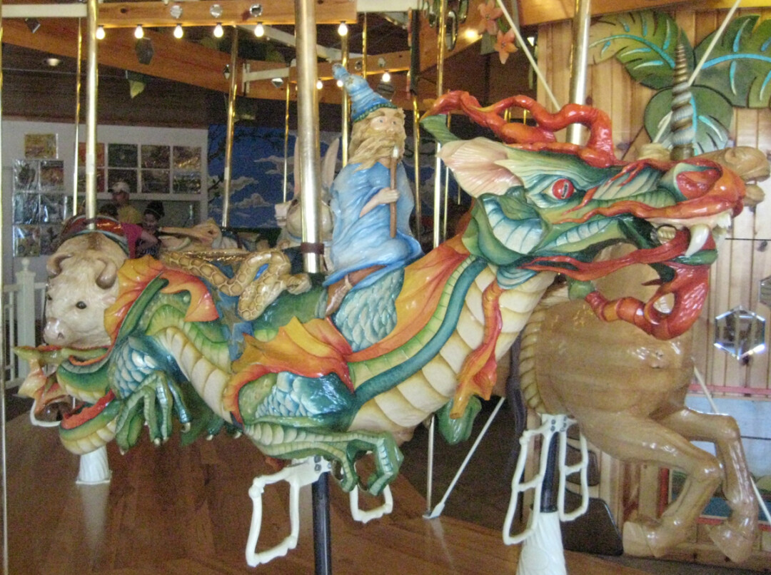 You're looking a wooden carousel dragon, handmade on-site at LARK Toys.