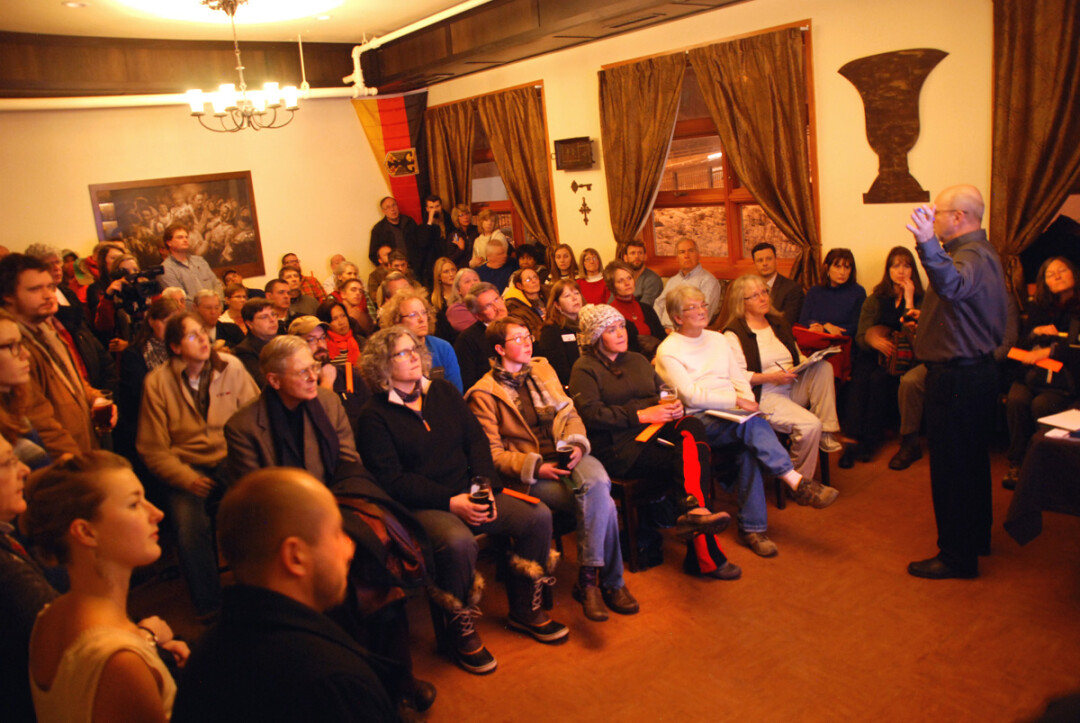 CITIZENS BREWING WITH CIVIC ENGAGEMENT. Phil Johnson of Ayres Associates discussed preliminary plans for the Cannery Redevelopment District in front of a standing-room-only audience during a community vision session January 21 at Lazy Monk Brewing.