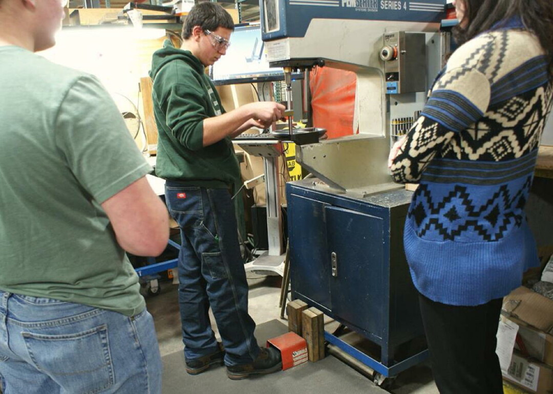 A PARTICIPANT IN THE CHIPPEWA COUNTY EXPLORER PROGRAM GETS HANDS-ON WORK EXPERIENCE AT PMI, A STEEL FABRICATION BUSINESS IN BLOOMER.