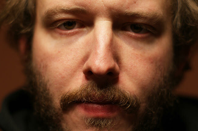 Justin Vernon's face, which produced vocals for Kanye West. 